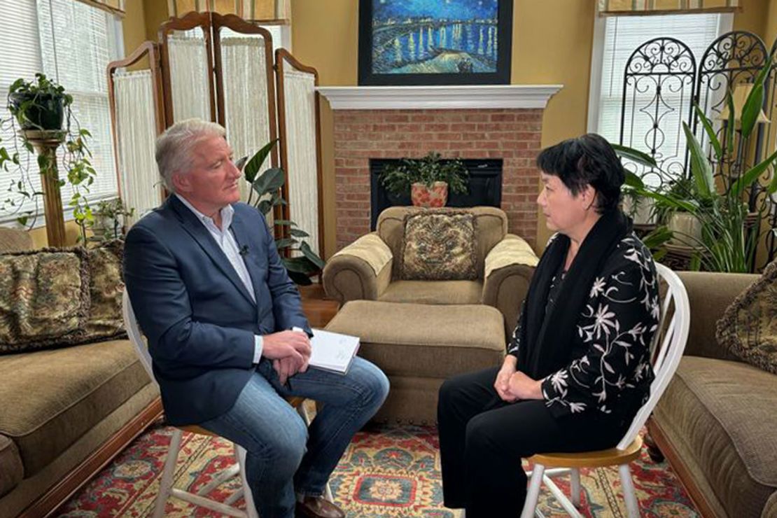 King speaks with voter Xi Van Fleet in Loudoun County, Virginia, in October.