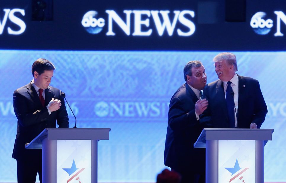 Christie visits with fellow presidential candidate Donald Trump during a commercial break of a Republican debate in February 2016. From the debate's outset, Christie pestered US Sen. Marco Rubio, left. His relentless attack against Rubio, who was surging in the polls, was one of <a href=